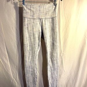 Lululemon running pants in grey and white pattern. Size 4.